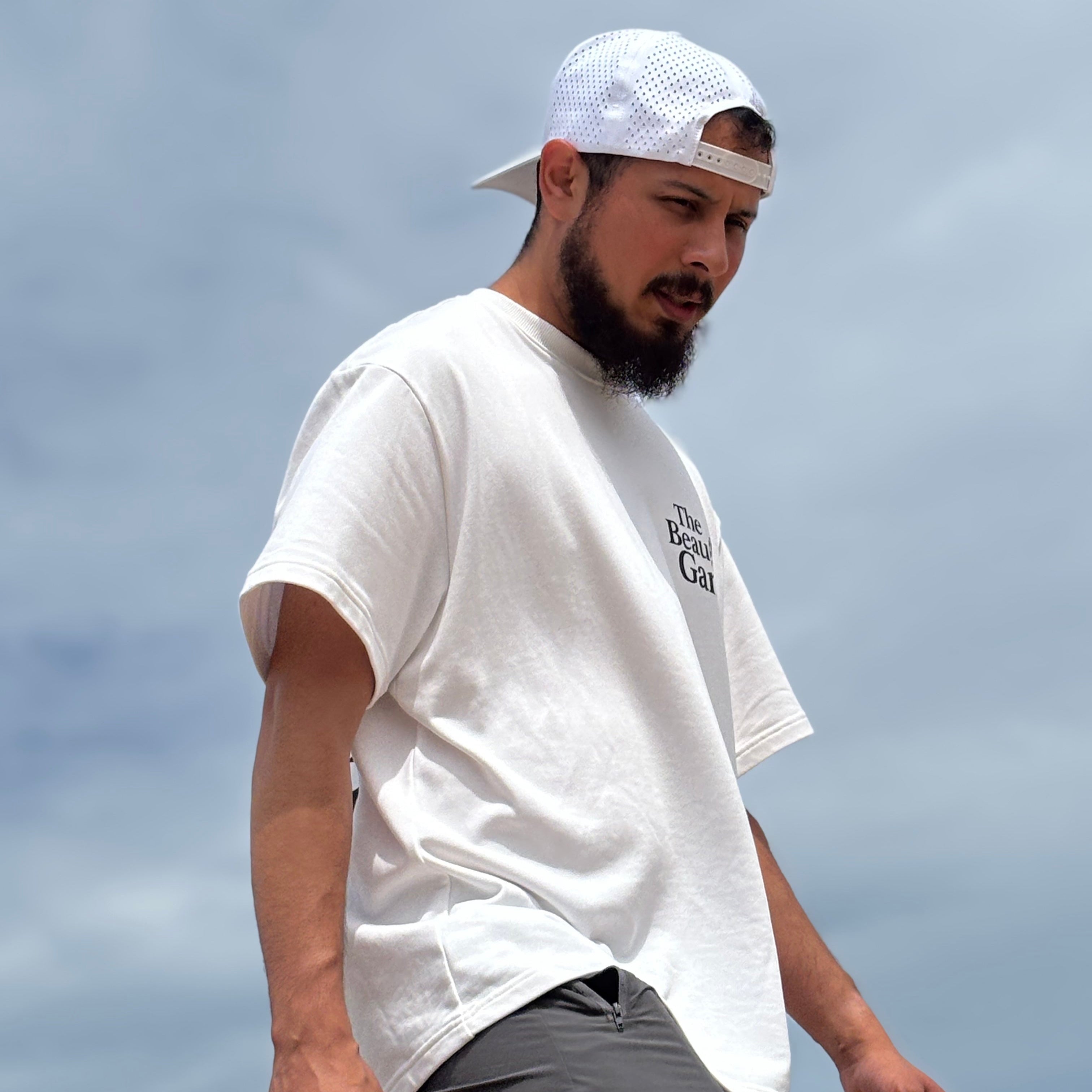 The Beautiful Game graphic tee, for soccer and football enthusiasts. Street wear to show your love of the world's sport.